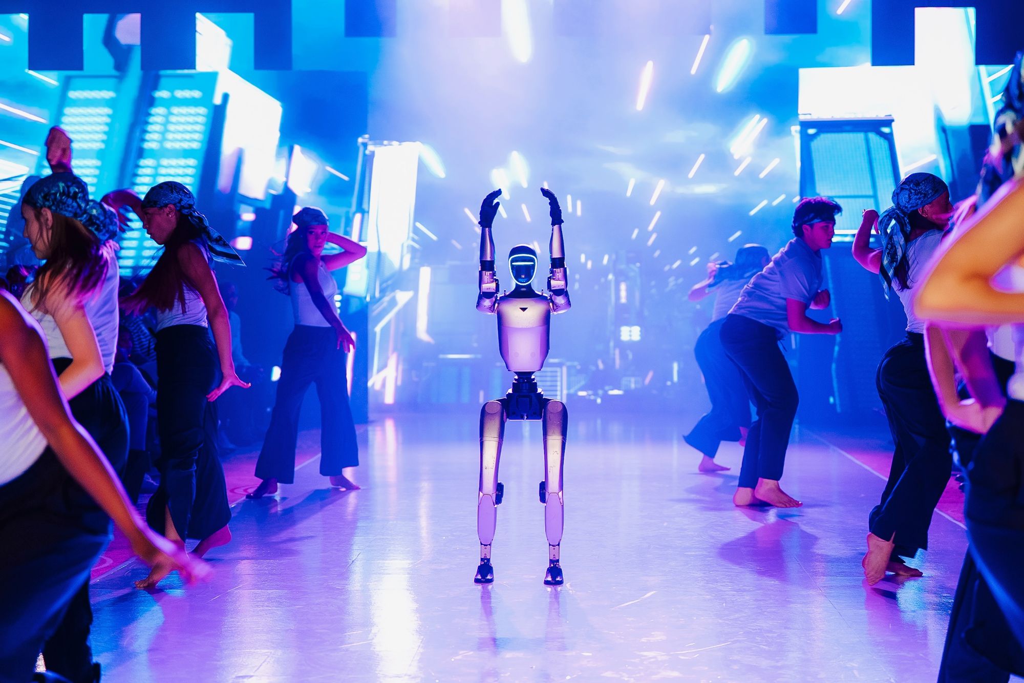 Custom opening act with dancers performing against an LED backdrop